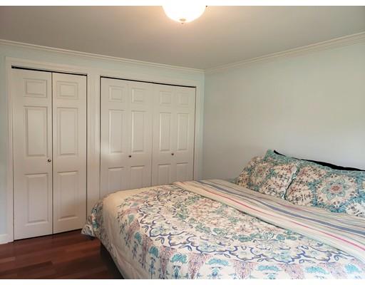 20 Mellen Street Hopedale, MA 01747 - Photo 6 of 22 a bedroom with a bed and a window