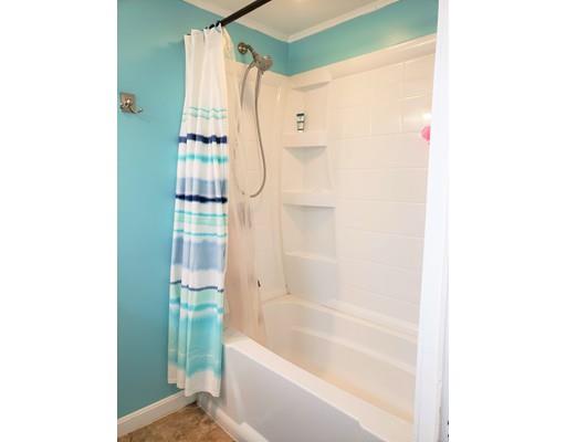 20 Mellen Street Hopedale, MA 01747 - Photo 10 of 22 a bathroom with a bathtub and shower