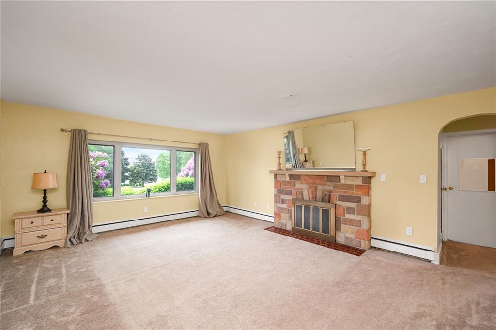 120 West Sunbury Road Butler, PA 16001 - Photo 15 of 46 an empty room with furniture and windows