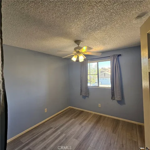 a view of swimming pool with outdoor seating and city view