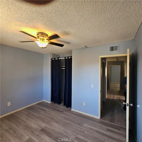 a bathroom with a sink double vanity granite tub shower and a mirror