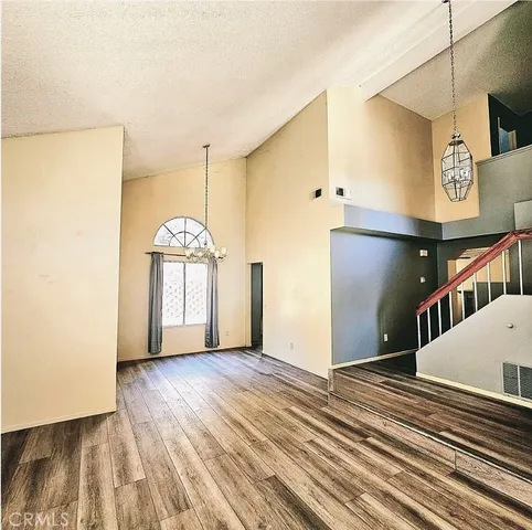 a kitchen with stainless steel appliances granite countertop a stove and cabinets
