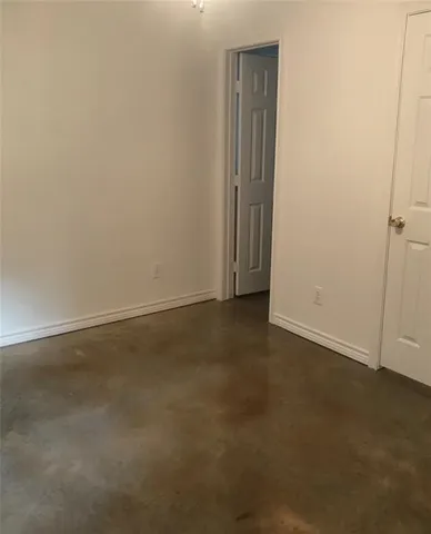 an empty room with an empty room