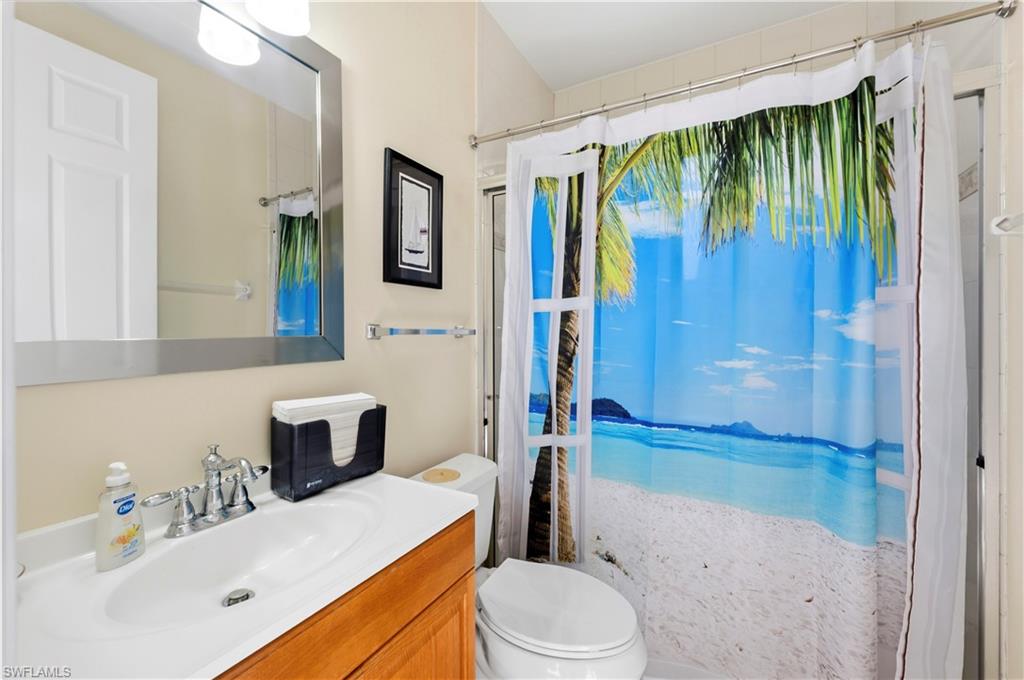 1411 Princess Sabal Point Naples, FL 34119 - Photo 14 of 30 a bathroom with a sink toilet and shower