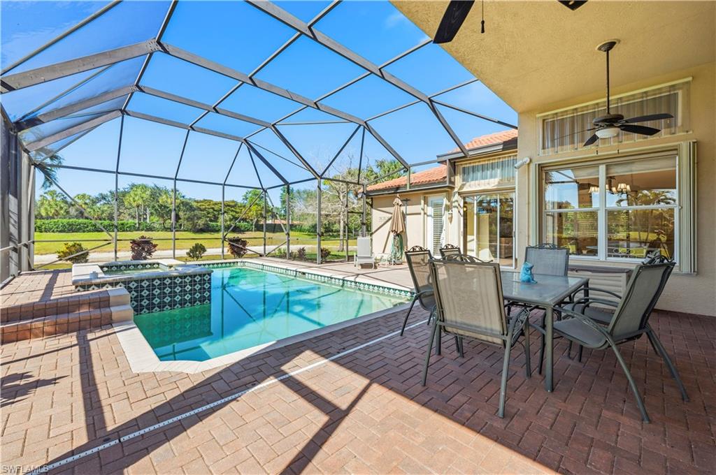 1411 Princess Sabal Point Naples, FL 34119 - Photo 19 of 30 a view of a outdoor sitting area with furniture