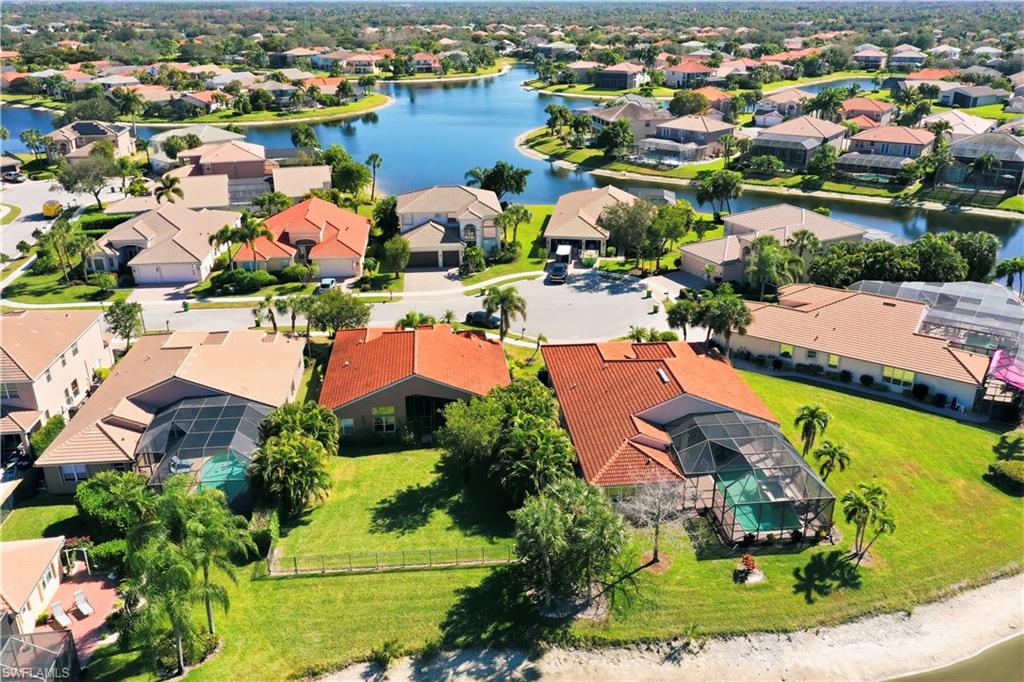 1411 Princess Sabal Point Naples, FL 34119 - Photo 23 of 31 Aerial overview of property's location featuring a nearby body of water and nearby suburban area