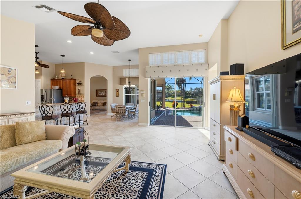 1411 Princess Sabal Point Naples, FL 34119 - Photo 8 of 30 a living room with furniture