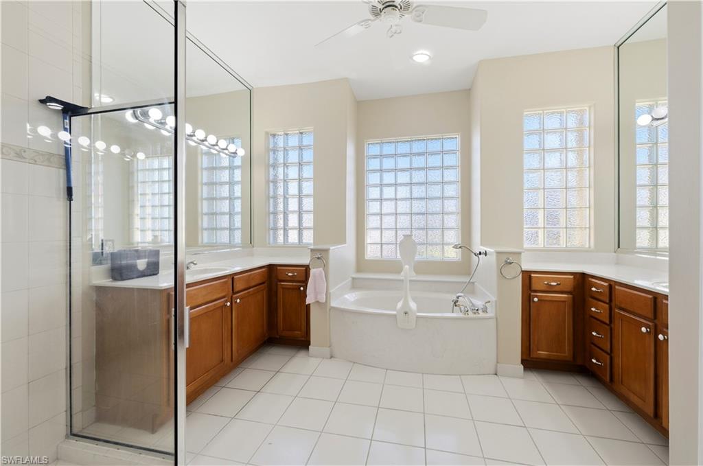 1411 Princess Sabal Point Naples, FL 34119 - Photo 10 of 30 a large spacious bathroom with a large tub shower and sink