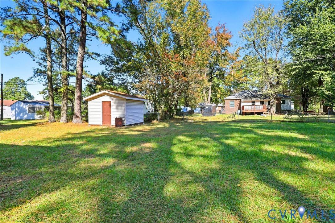 2521 Fort Lee Road Petersburg, VA 23805 - Photo 24 of 27 a view of a house with a backyard