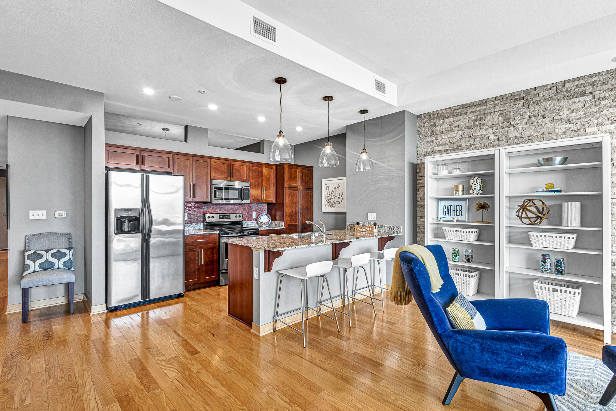 106 West Seeboth Street, Unit 813 Milwaukee, WI 53204 - Photo 4 of 48 Kitchen & Living Room