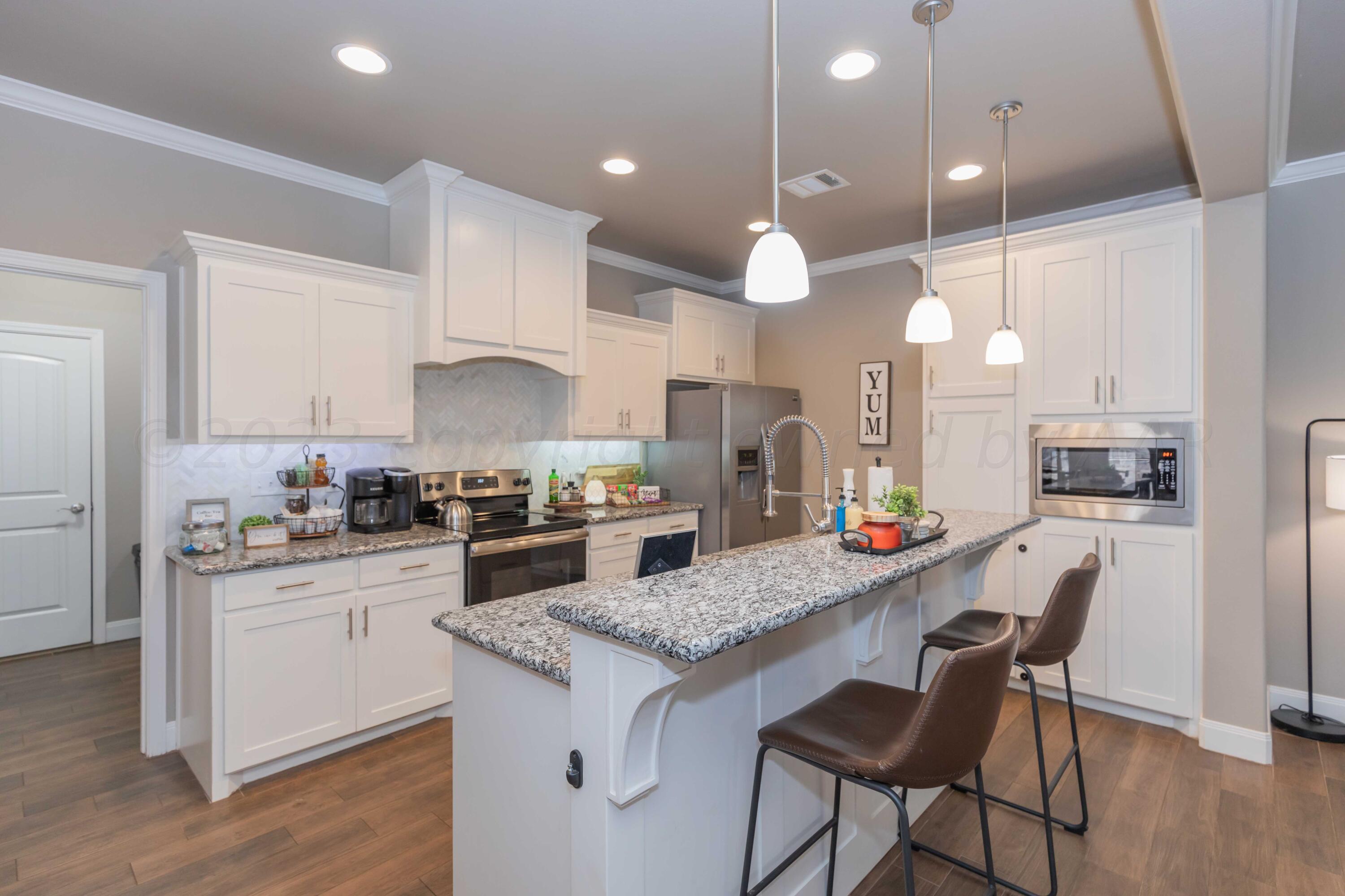 8907 Staten Island Amarillo, TX 79119 - Photo 11 of 51 KITCHEN VIEW 3