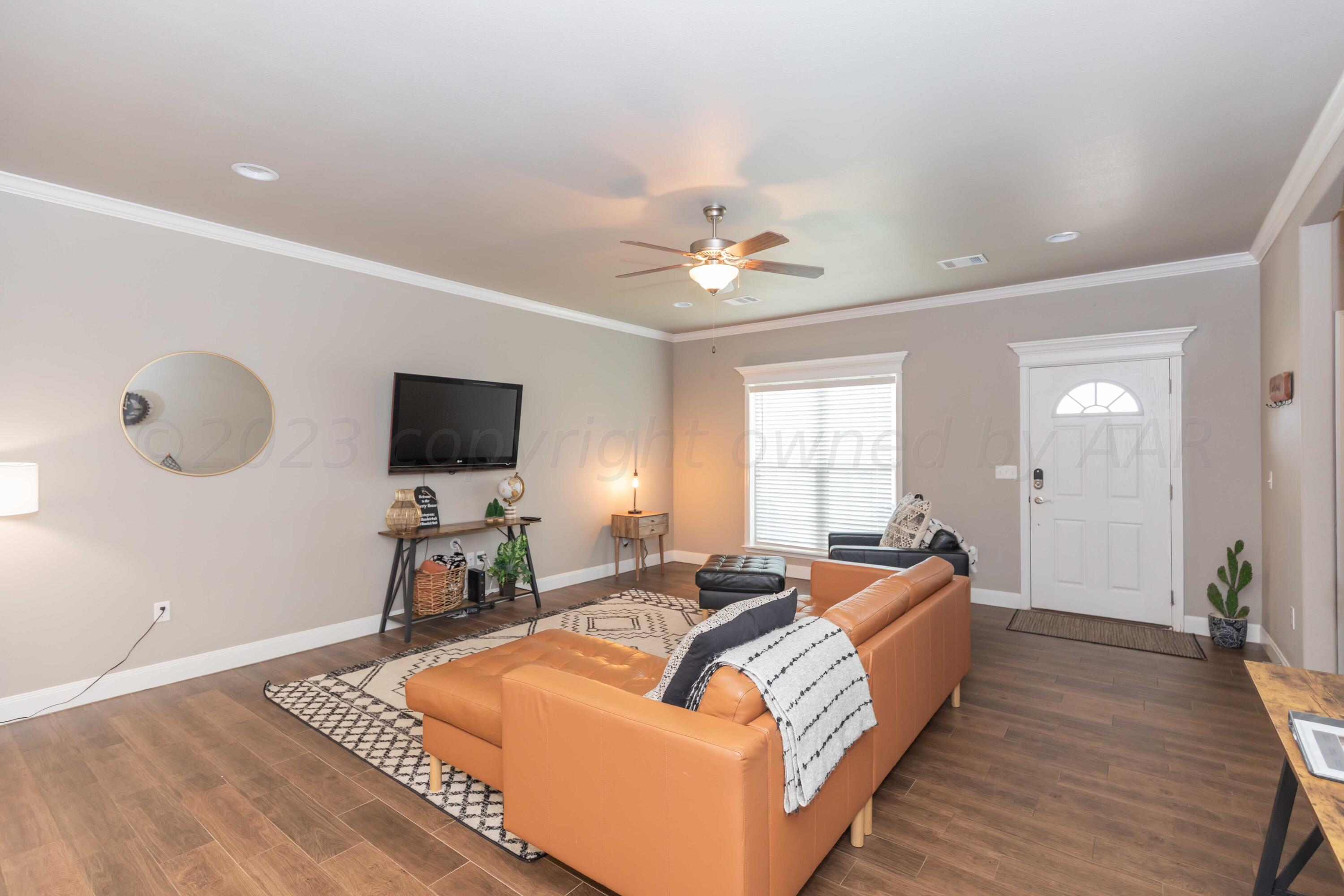 8907 Staten Island Amarillo, TX 79119 - Photo 5 of 51 LIVING ROOM VIEW 1