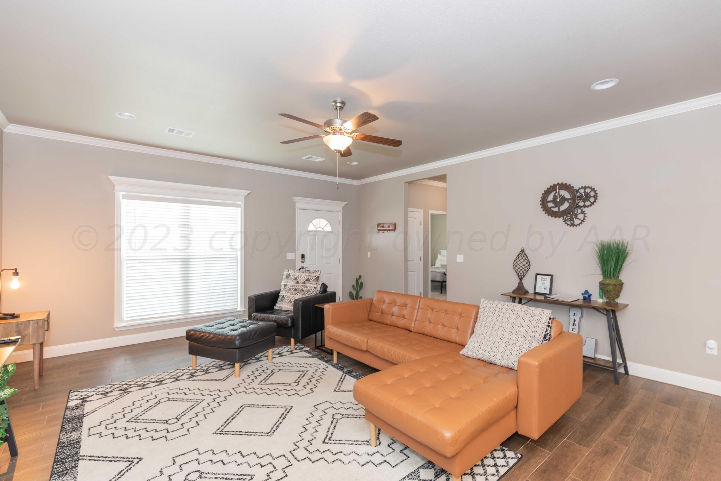 8907 Staten Island Amarillo, TX 79119 - Photo 6 of 51 LIVING ROOM VIEW 2