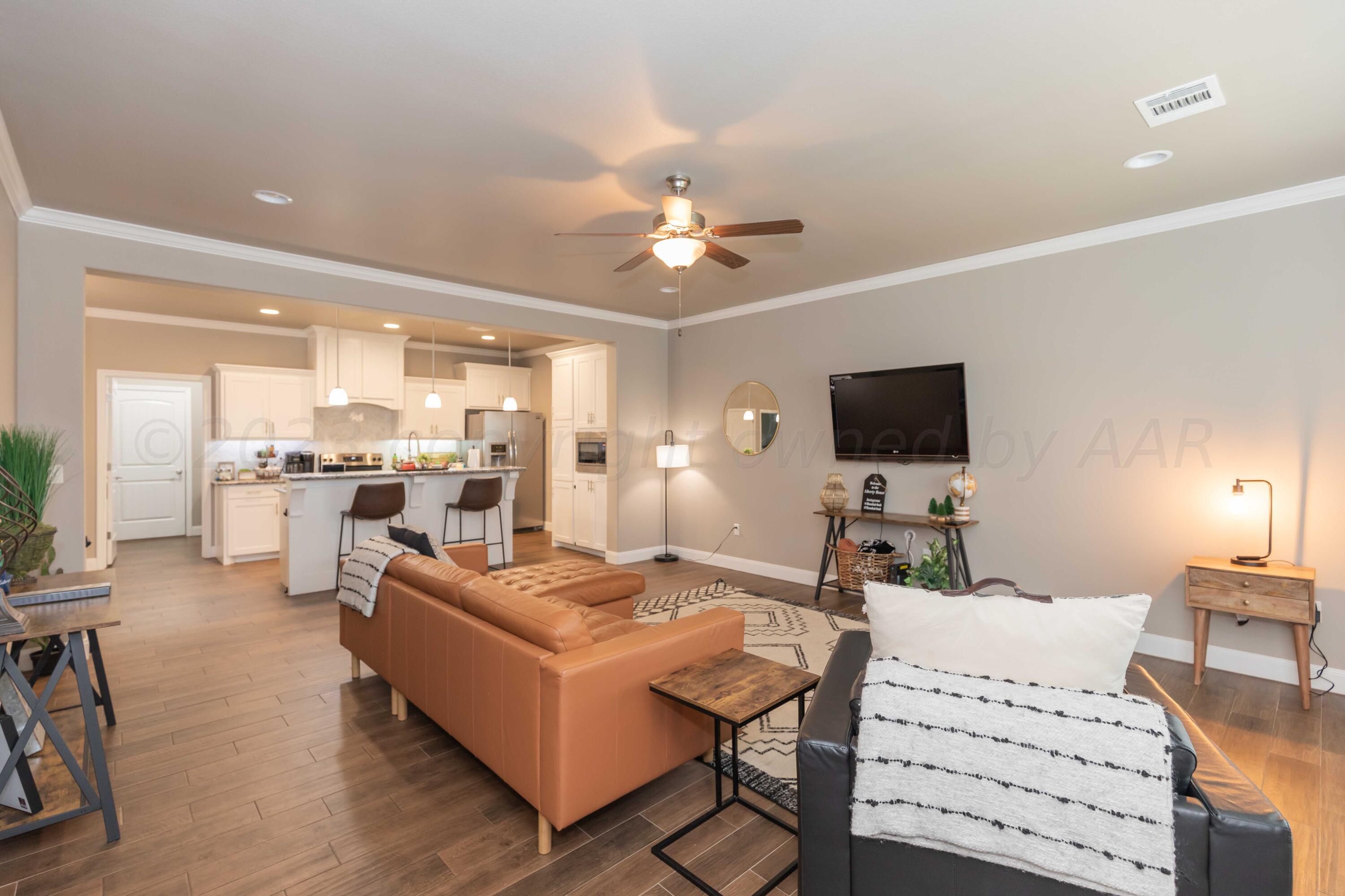 8907 Staten Island Amarillo, TX 79119 - Photo 8 of 51 LIVING ROOM VIEW 4