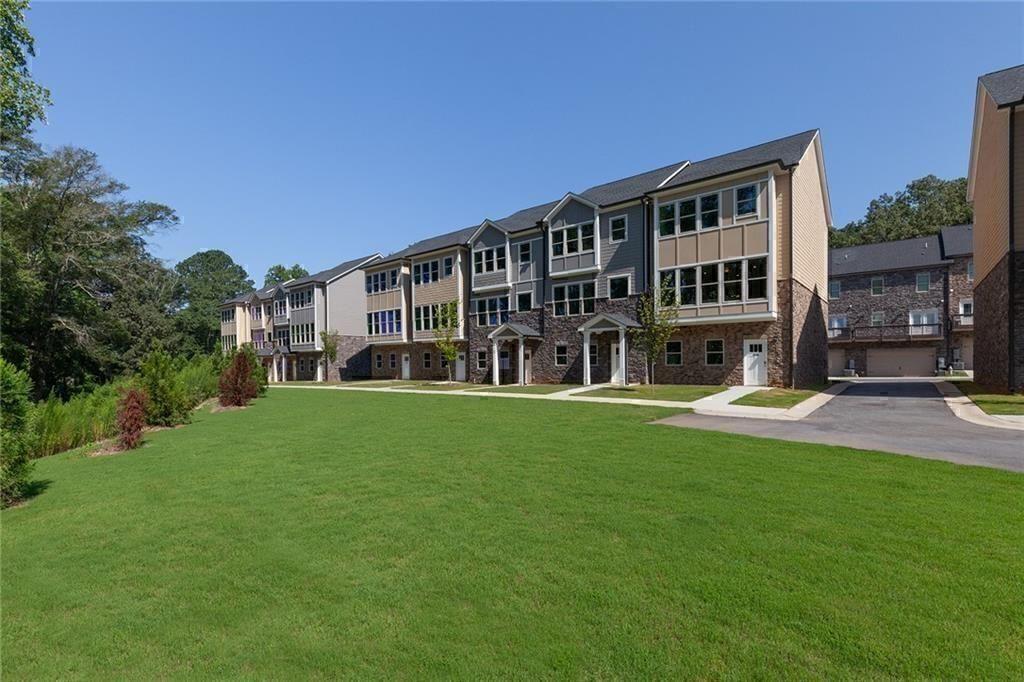 3798 Jack Vernon Circle Powder Springs, GA 30127 - Photo 1 of 1 a view of house with yard and outdoor seating