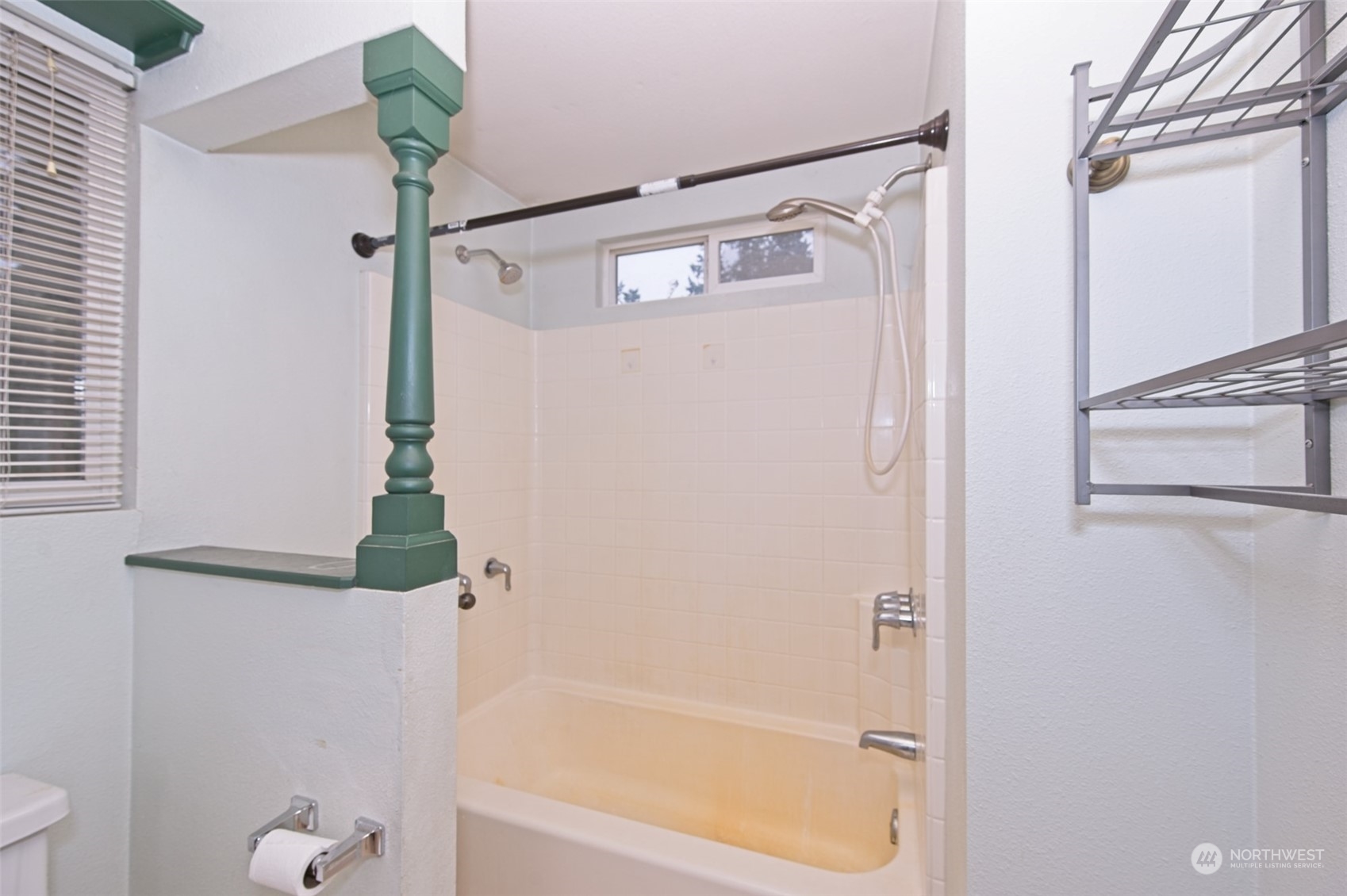 8121 Shoemaker Road Marysville, WA 98271 - Photo 16 of 20 a bathroom with a shower and a tub