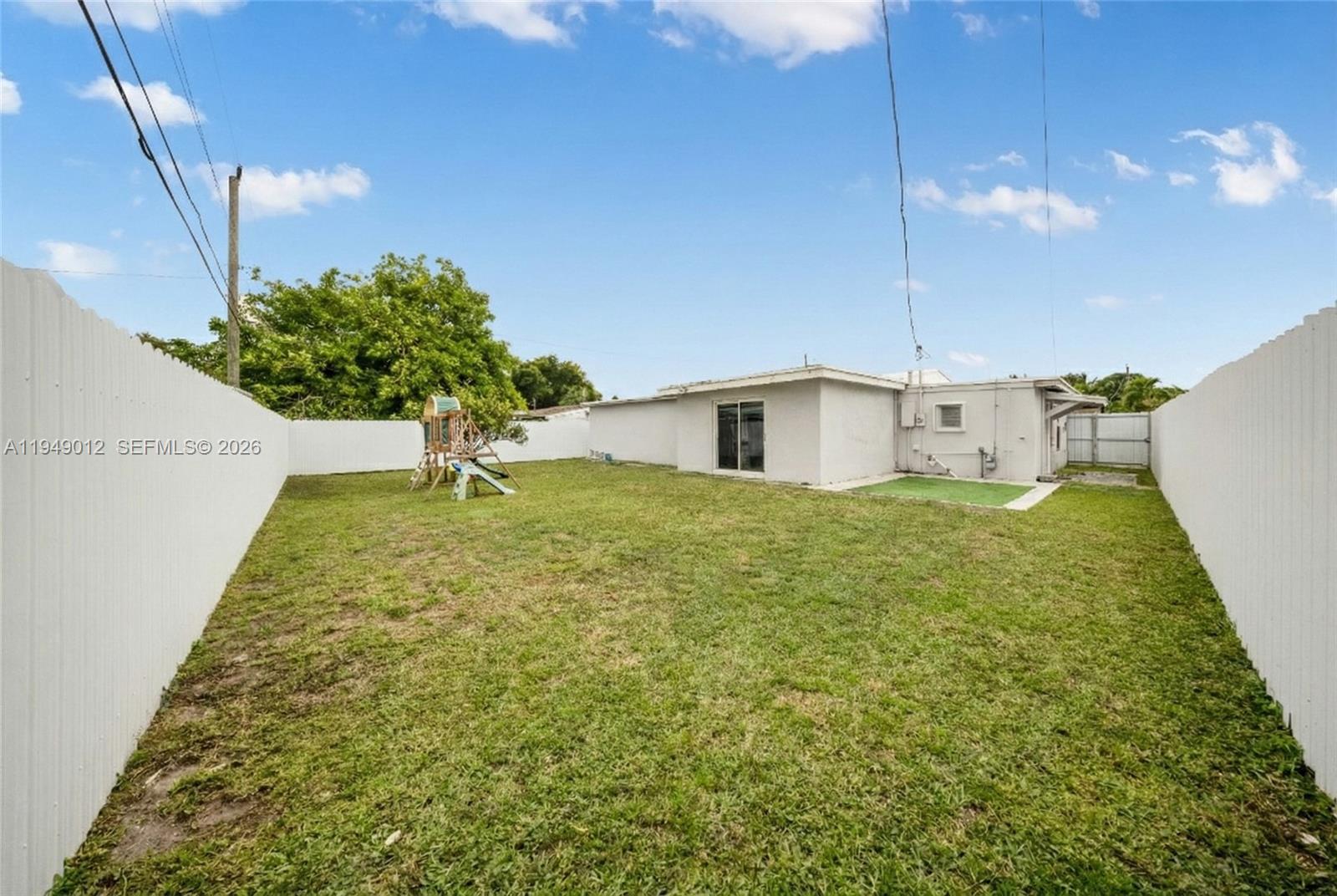 6971 Southwest 24th Street Miramar, FL 33023 - Photo 19 of 22 a bathroom with a sink and mirror