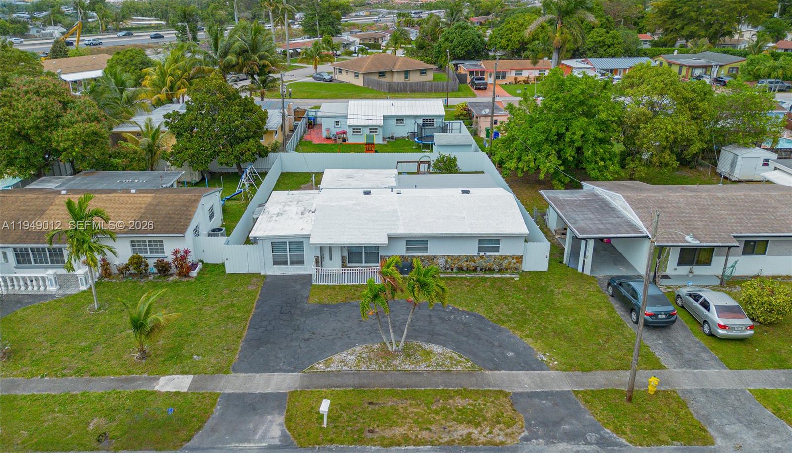6971 Southwest 24th Street Miramar, FL 33023 - Photo 4 of 22 an aerial view of a house with a garden