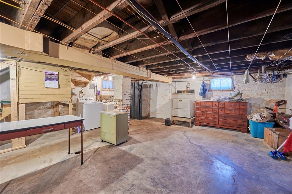 1816 Lenz Avenue Ambridge, PA 15003 - Photo 15 of 17 Large basement with laundry room, Pittsburgh potty and coal seller.