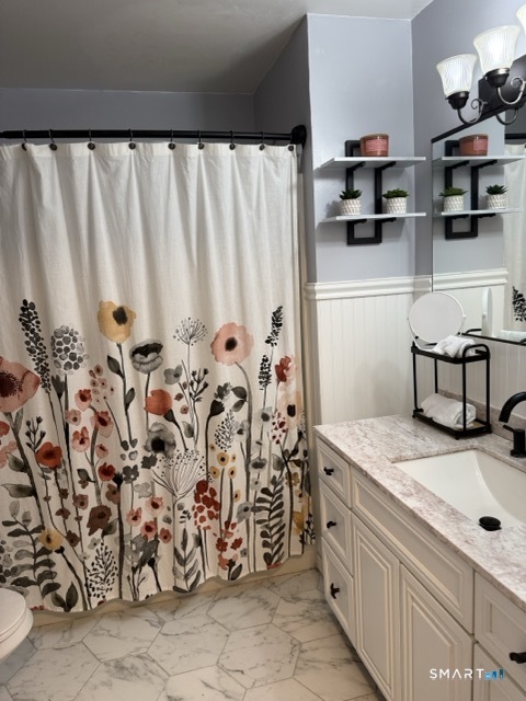 7 Riverview Street Enfield, CT 06082 - Photo 22 of 29 a bathroom with a granite countertop sink and a mirror