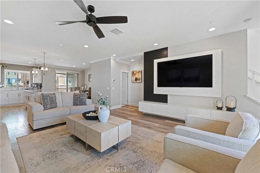 135 Alder Ridge Lake Forest, CA 92610 - Photo 17 of 30 a living room with furniture and a flat screen tv