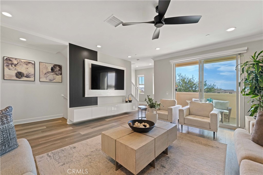 135 Alder Ridge Lake Forest, CA 92610 - Photo 18 of 30 a living room with furniture and a flat screen tv