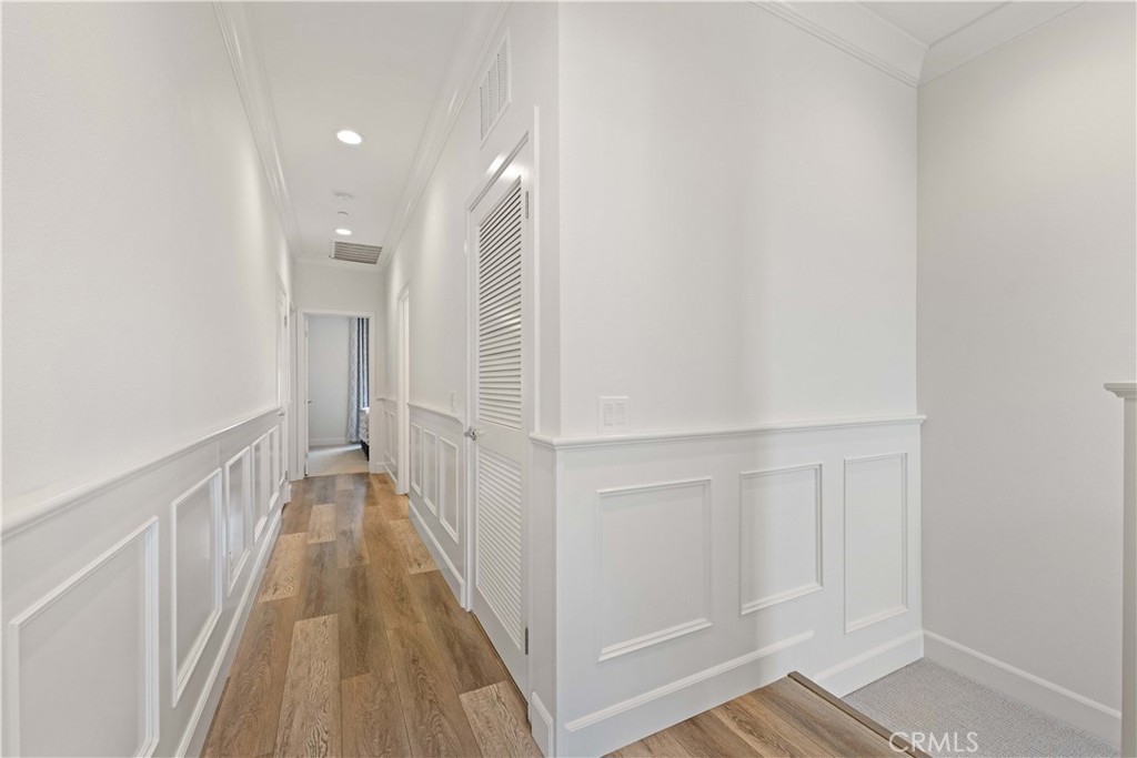 135 Alder Ridge Lake Forest, CA 92610 - Photo 29 of 30 a view of a hallway with wooden floor and entryway