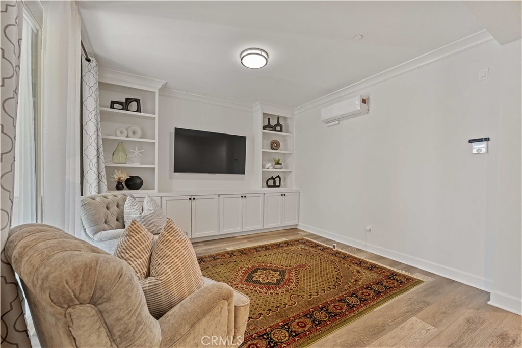 135 Alder Ridge Lake Forest, CA 92610 - Photo 4 of 30 a living room with furniture and a flat screen tv