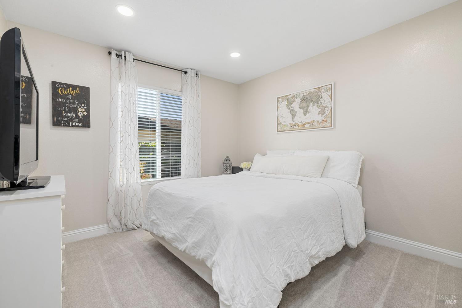 5328 Daniel Drive Rohnert Park, CA 94928 - Photo 14 of 42 a bedroom with a bed and a flat screen tv