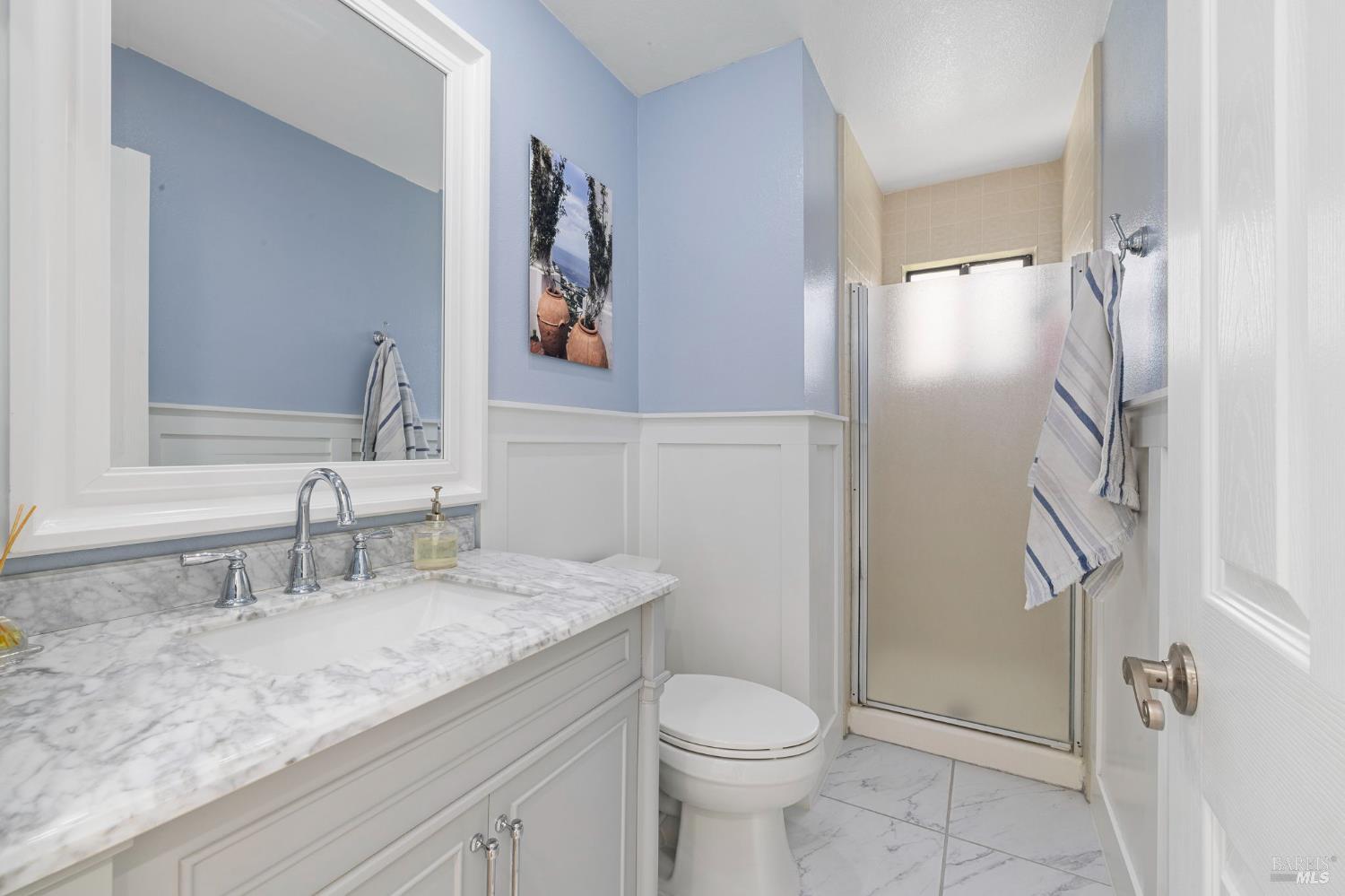 5328 Daniel Drive Rohnert Park, CA 94928 - Photo 15 of 42 a bathroom with a granite countertop sink toilet and shower