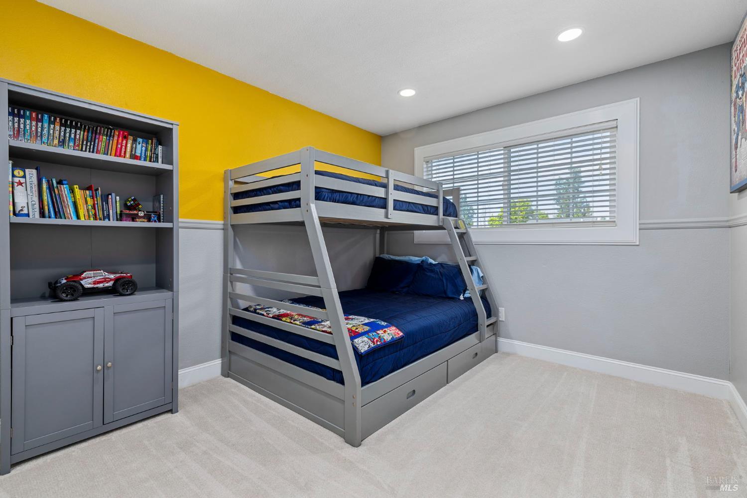 5328 Daniel Drive Rohnert Park, CA 94928 - Photo 20 of 42 a bedroom with bed and a book shelf