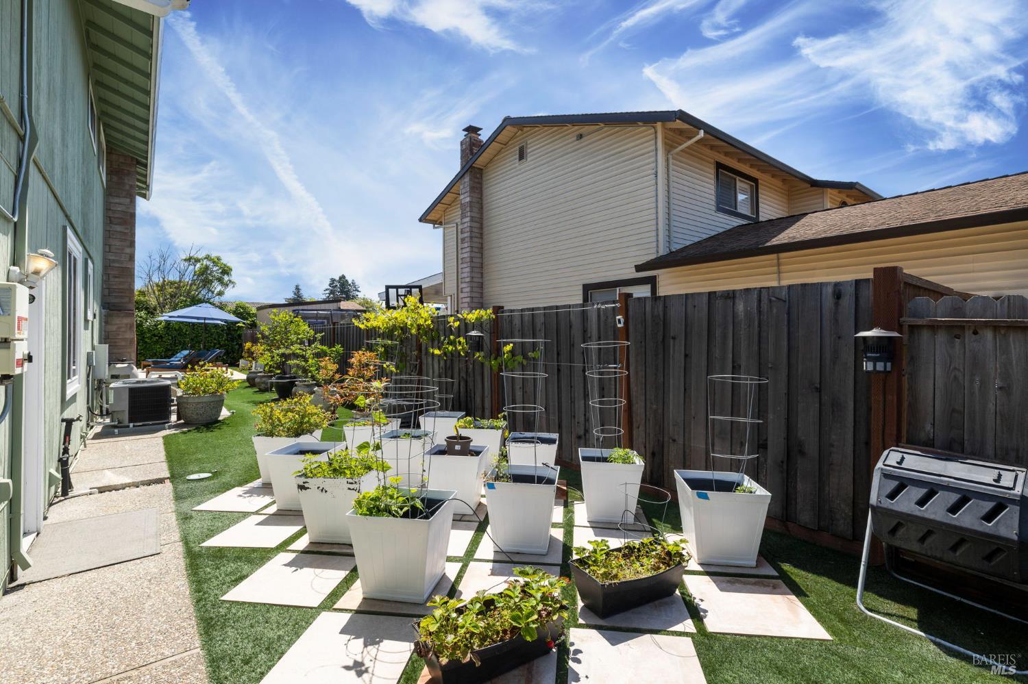 5328 Daniel Drive Rohnert Park, CA 94928 - Photo 28 of 42 a view of a patio with couches table and chairs and potted plants