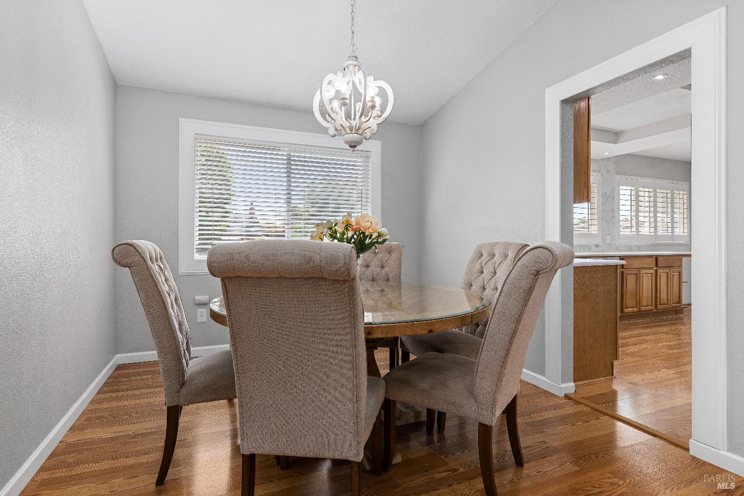5328 Daniel Drive Rohnert Park, CA 94928 - Photo 7 of 42 a view of a dining room with furniture wooden floor and chandelier
