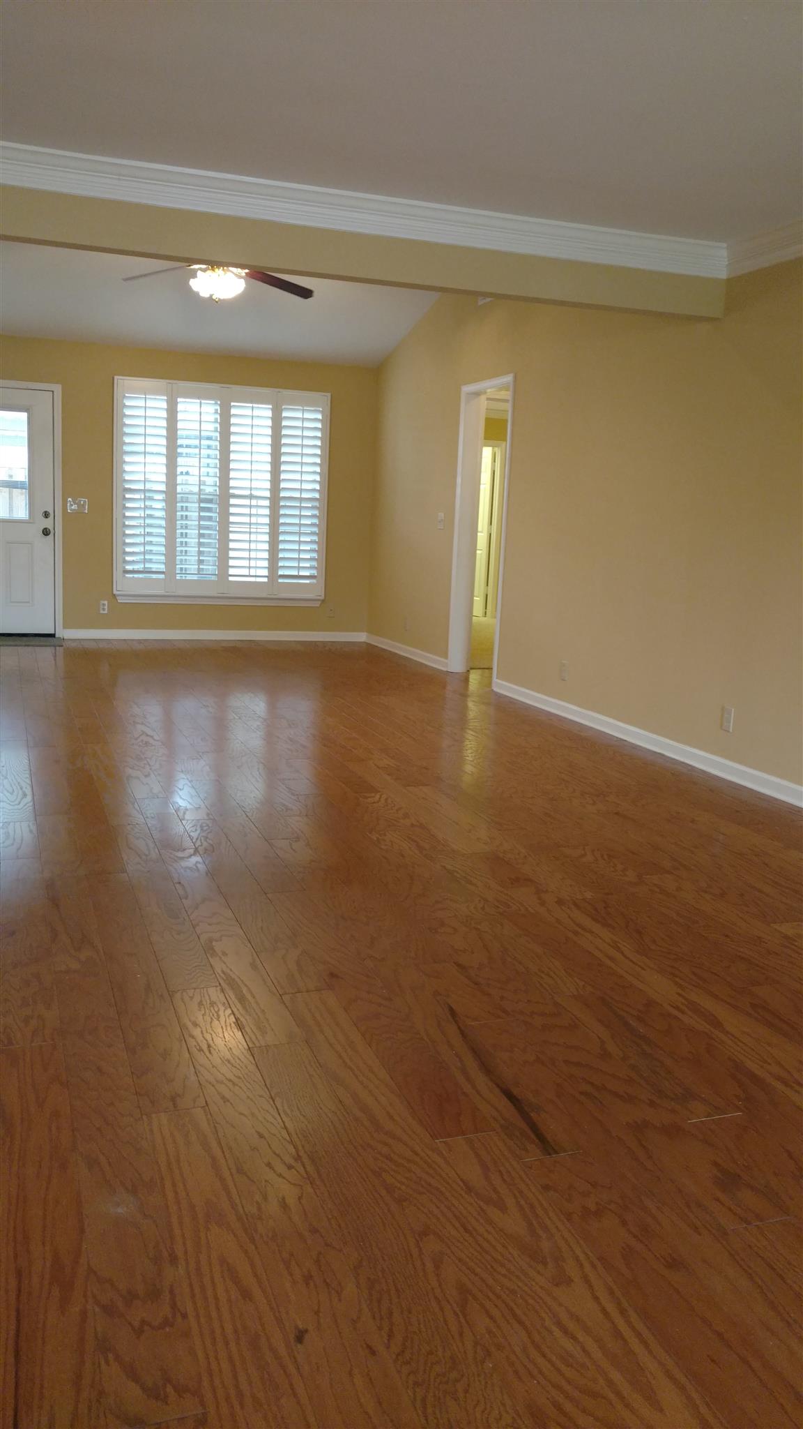 1246 General George Patton Road, Unit 1246 Nashville, TN 37221 - Photo 6 of 7 wooden floor in an empty room with a window