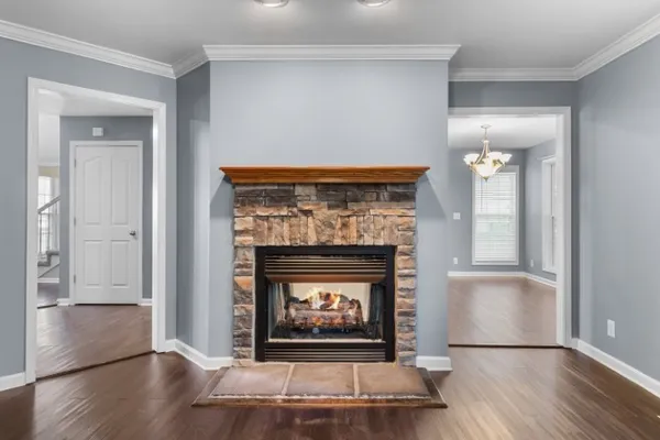 a living room with a fireplace