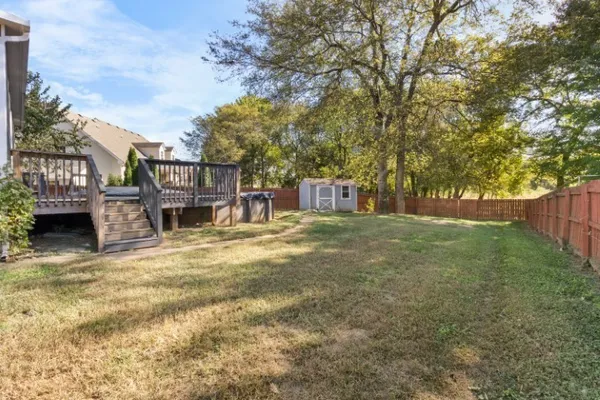 a house view with a garden space
