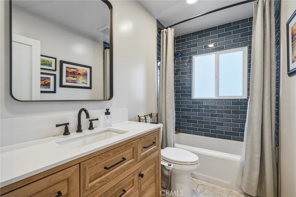 2028 Chesson Street Duarte, CA 91010 - Photo 24 of 66 Updated bathroom with hexagonal tile flooring, oversized vanity and floor-to-ceiling subway tile