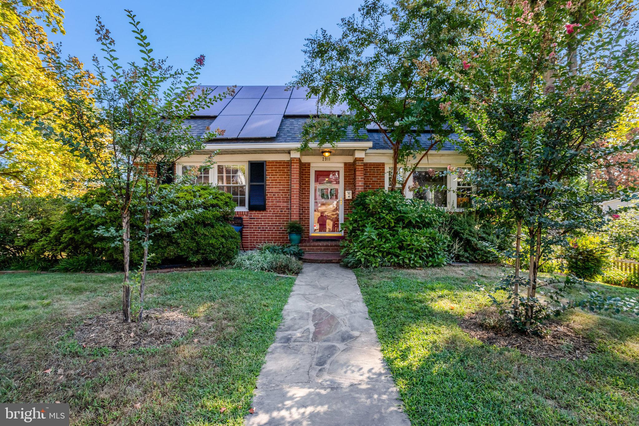 2911 Edgehill Drive Alexandria, VA 22302 - Photo 1 of 38 a front view of a house with garden