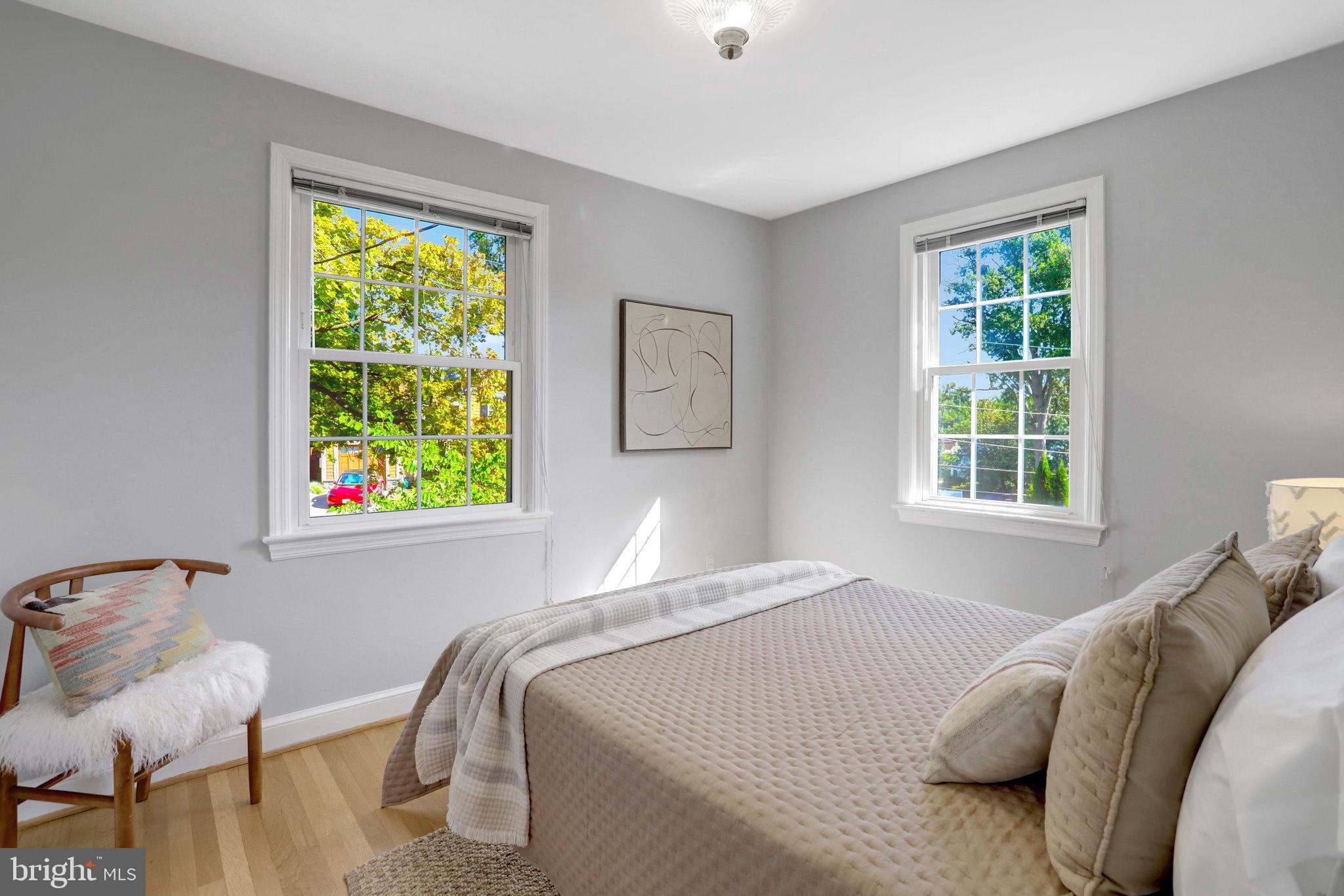 2911 Edgehill Drive Alexandria, VA 22302 - Photo 17 of 38 a bedroom with a bed and windows