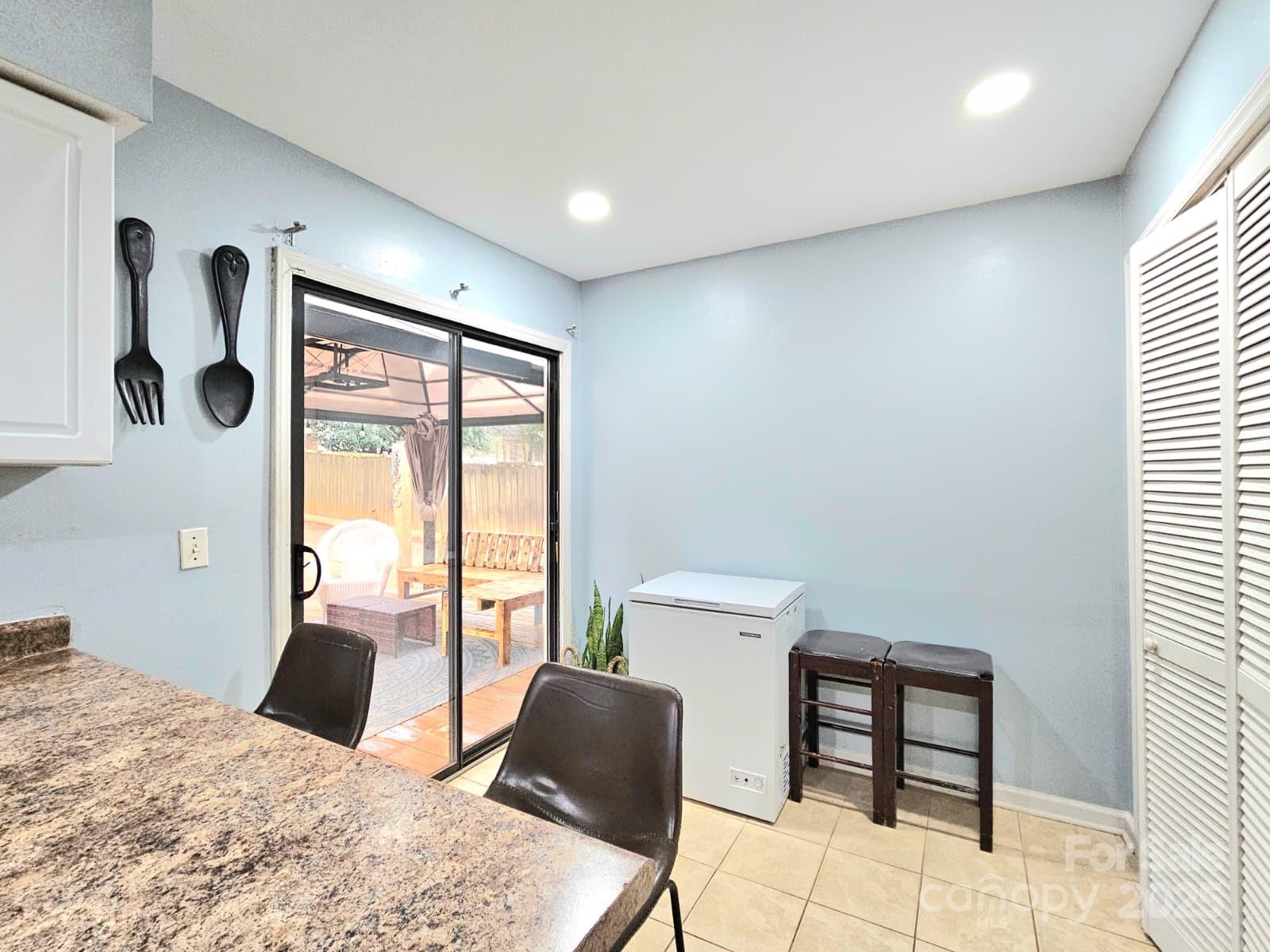 7344 Rena Mae Lane Charlotte, NC 28227 - Photo 4 of 19 a bedroom with a bed and a window