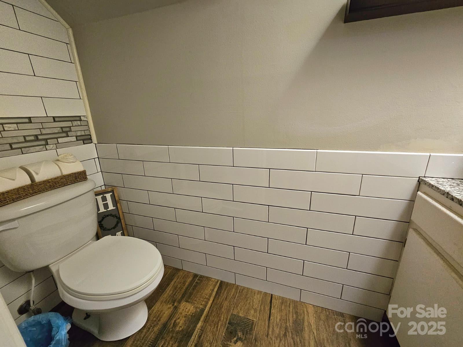 7344 Rena Mae Lane Charlotte, NC 28227 - Photo 5 of 19 a bathroom with a toilet and a shower