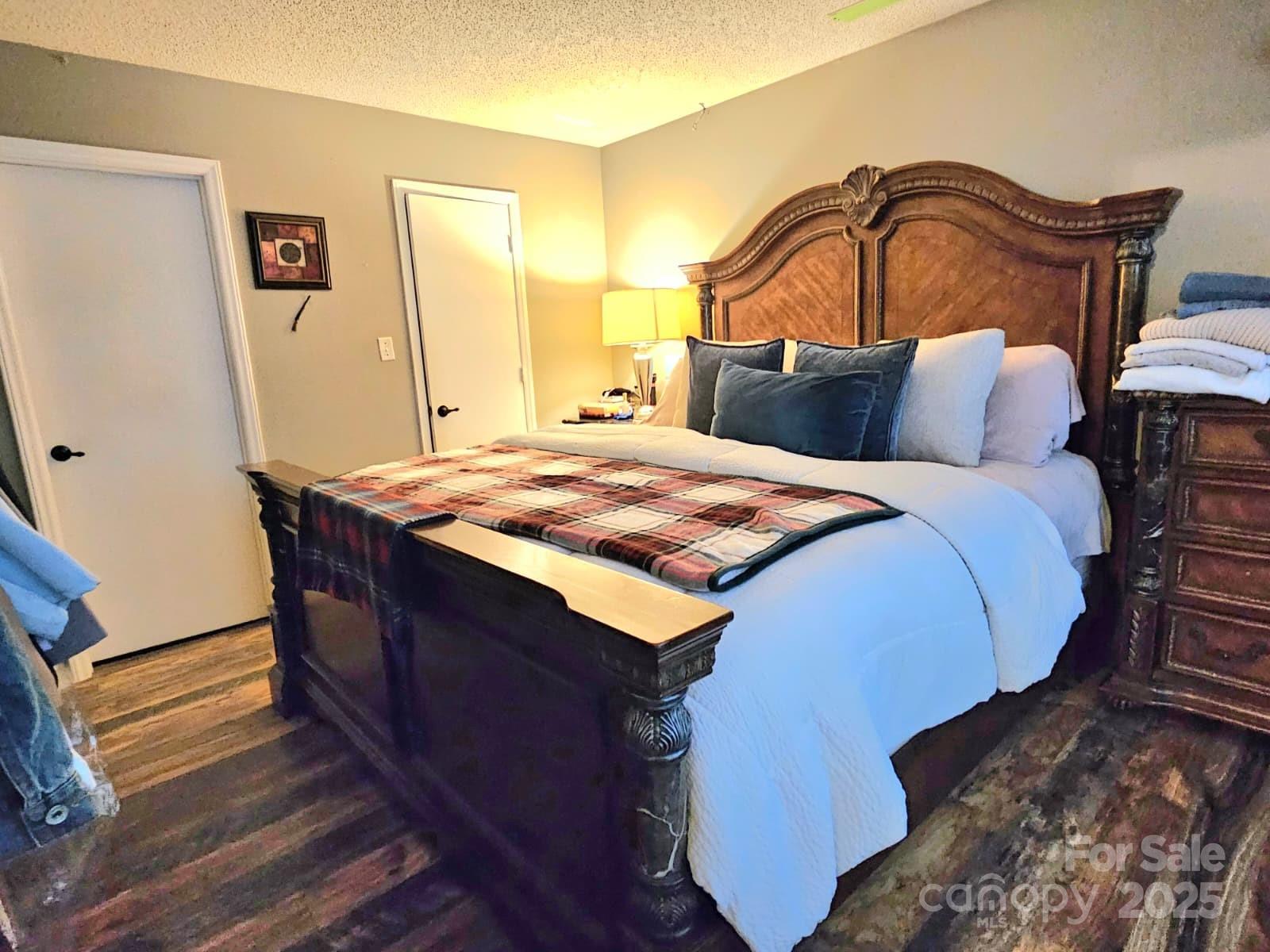 7344 Rena Mae Lane Charlotte, NC 28227 - Photo 7 of 19 a bedroom with a bed and a window