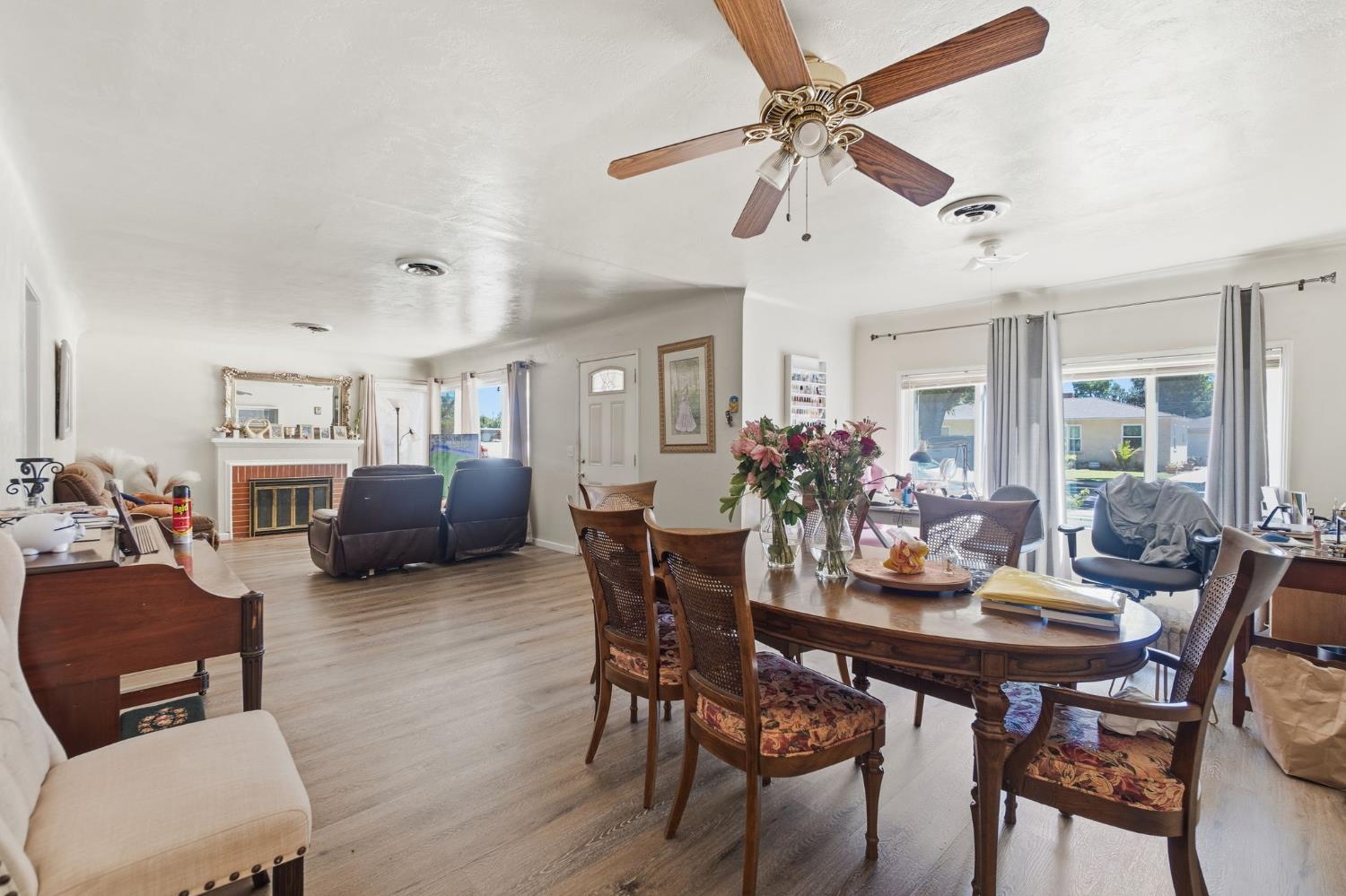 1705 Stetson Avenue Modesto, CA 95350 - Photo 8 of 32 a view of a dining room with furniture and a chandelier
