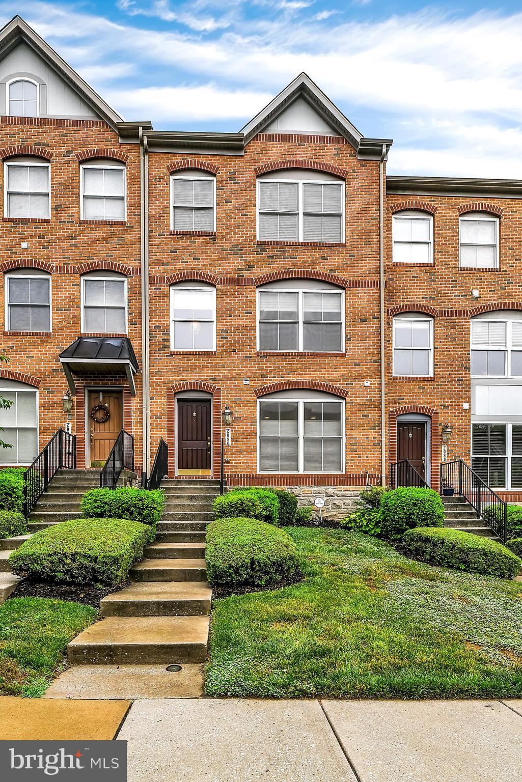2090 Clipper Park Road Baltimore, MD 21211 - Photo 37 of 75 a front view of a house with garden