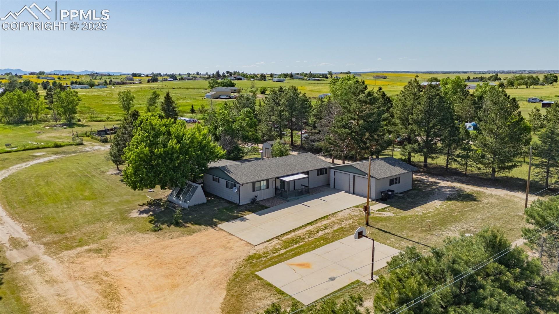 6010 Curtis Road Peyton, CO 80831 - Photo 1 of 42 Welcome home to 5 acres in the country