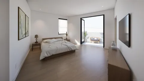 a bedroom with a bed and wooden floor
