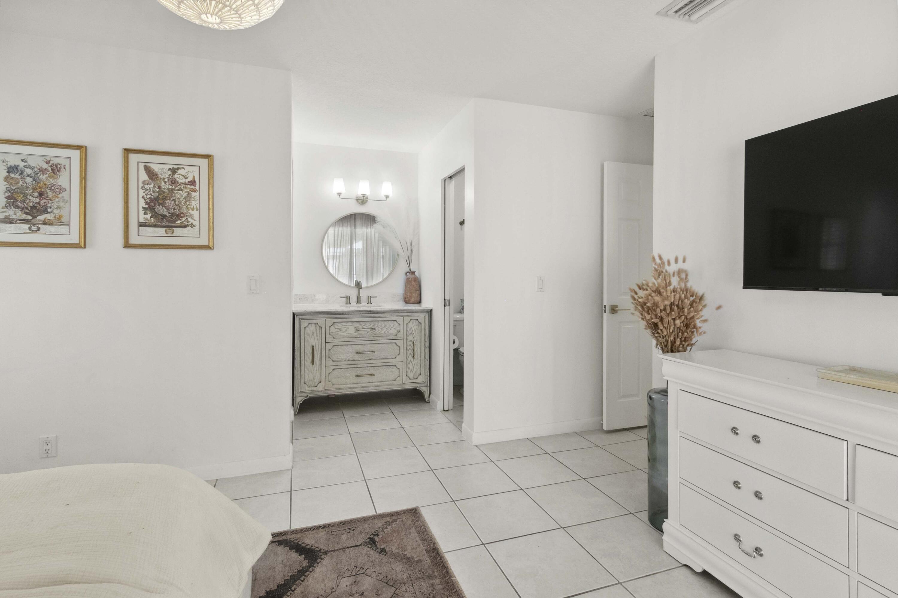 116 Sherwood Circle, Unit 7A Jupiter, FL 33458 - Photo 12 of 29 Master Suite