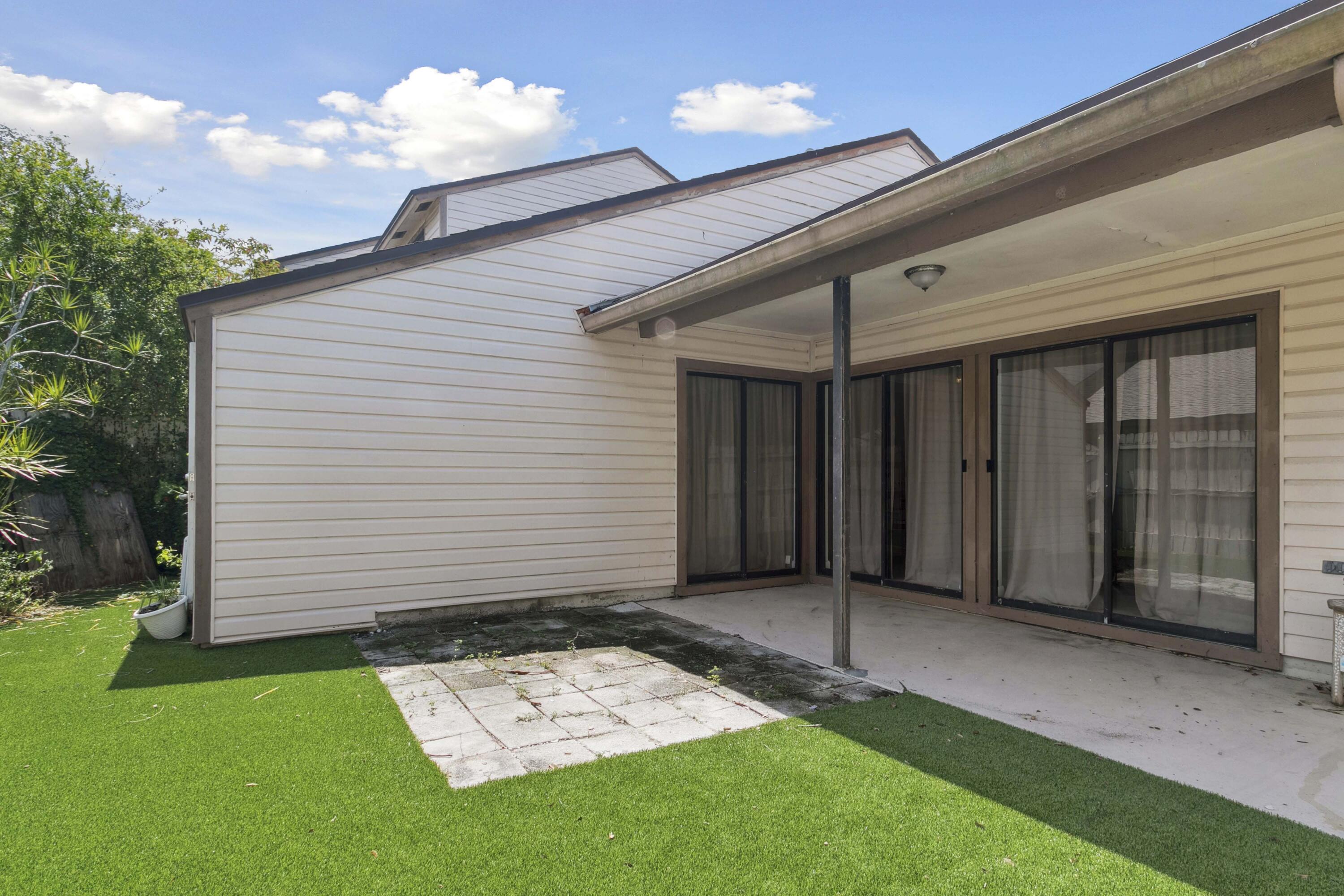 116 Sherwood Circle, Unit 7A Jupiter, FL 33458 - Photo 17 of 29 Backyard