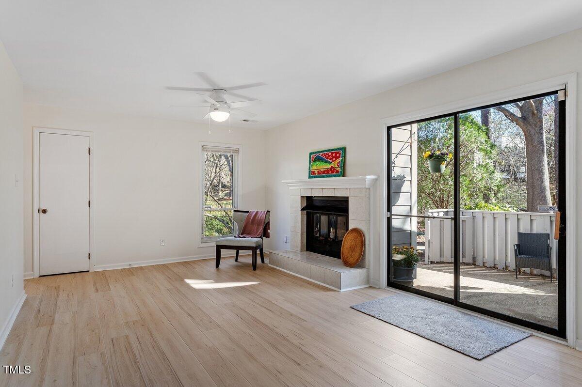 205 Clancy Circle Cary, NC 27511 - Photo 10 of 36 a living room with furniture and a fireplace