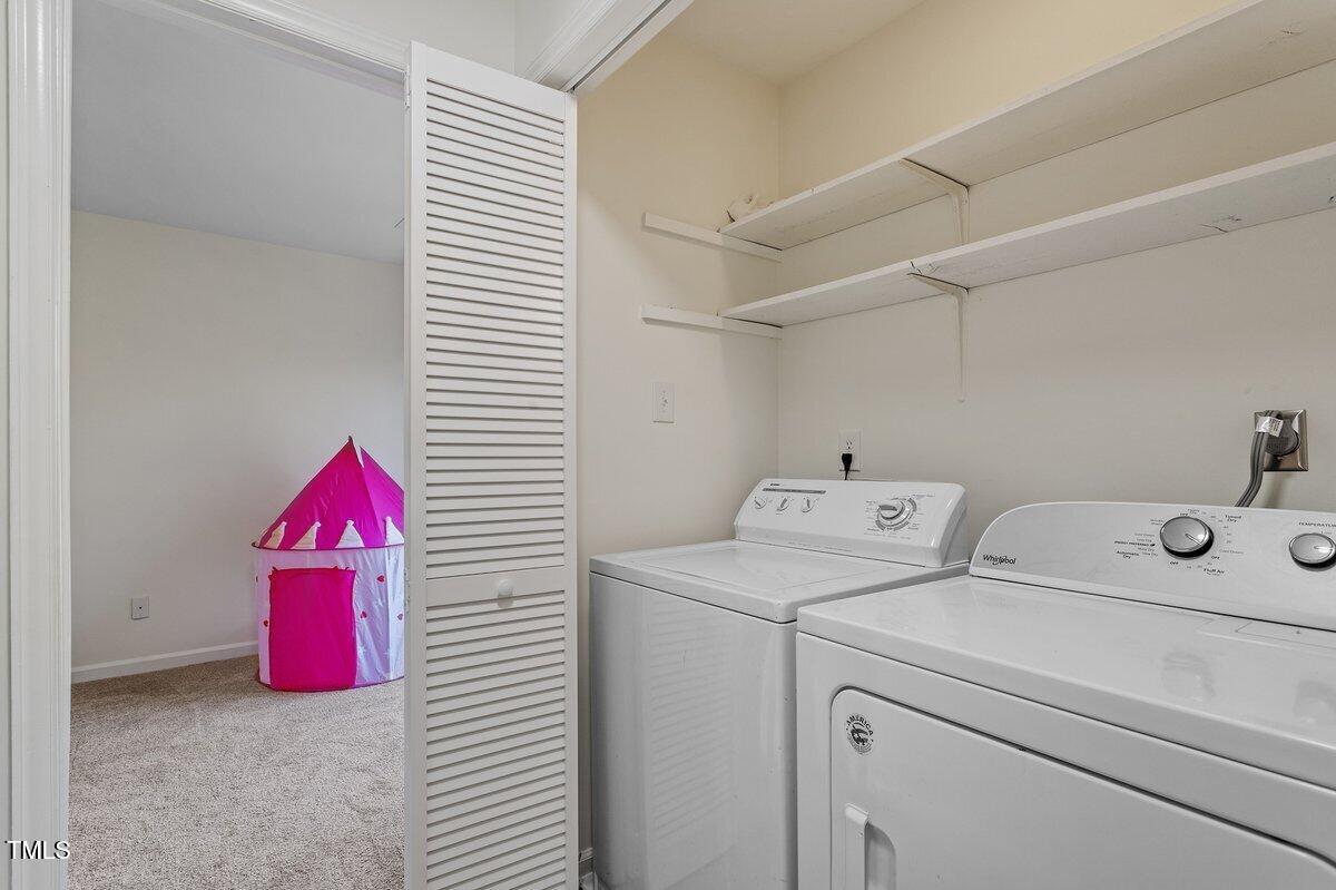 205 Clancy Circle Cary, NC 27511 - Photo 26 of 36 a utility room with dryer and washer